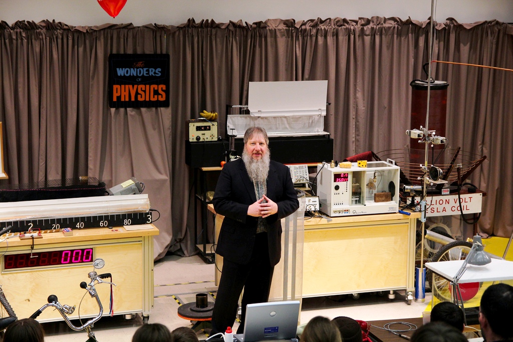 Man Presenting on Stage
